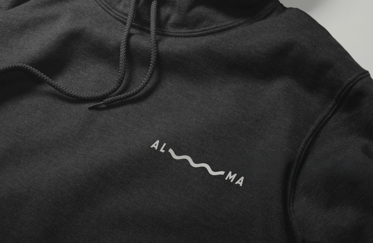 Demazzi Stone Grill Website shown displaying on a mobile phone.